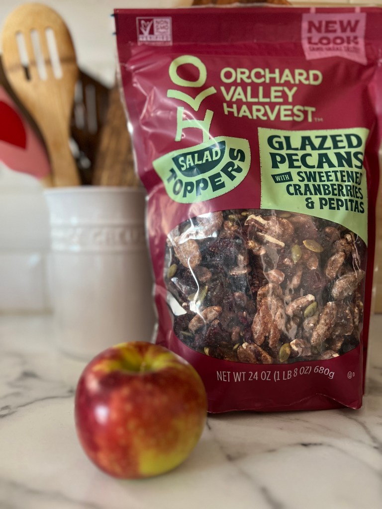 there’s my other fall obsession, cranberries and walnuts. I don’t even know why, but that combo feels so romantically fall. I want it everywhere. Tucked into bread, baked into muffins, sprinkled over salads. Especially salads. If you want the perfect fall salad, here’s the one: a mixed greens base, sliced apples, cranberries, walnuts, a sprinkle of goat cheese crumbles, and Fuji apple vinaigrette drizzled on top. Yum. It’s fresh, tangy, crunchy, sweet… basically autumn in a bowl.