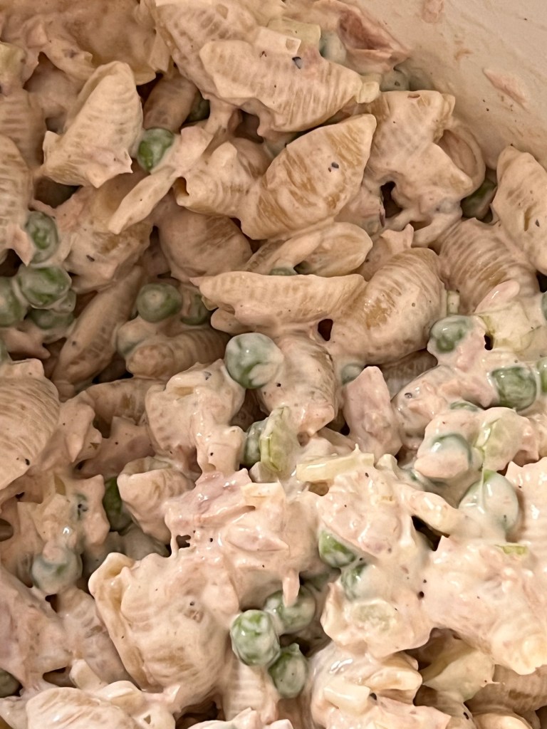 Old Fashioned like grandma made cold pasta salad with tuna and peas